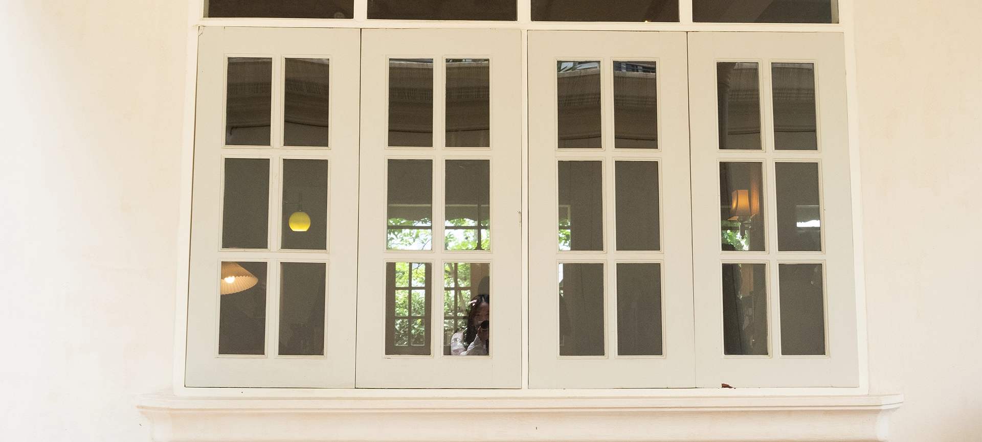 Cozy house exterior with wooden casement window and white wall rendering,Large estate home building Window Frame,minimal home concept.