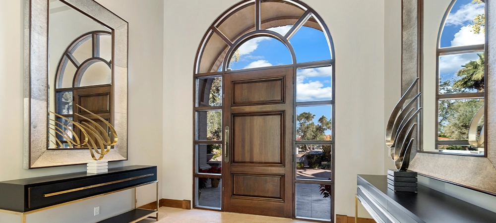 modern home front custom door, iron frame, arch style