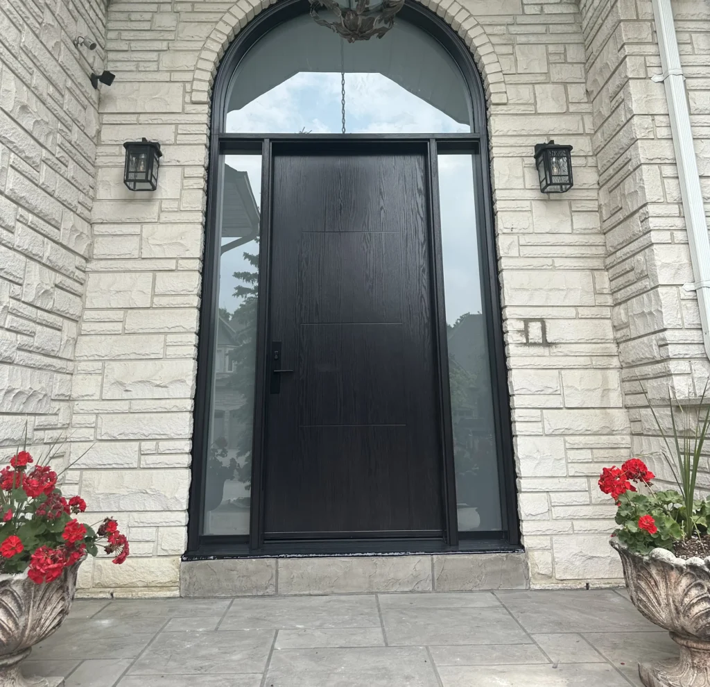 black fibreglass door with windows around it