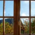 View through a Double glazed wooden window frame in the home in autumn season weather